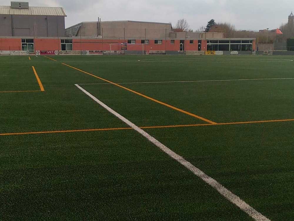 Césped artificial campos de futbol · Pavimentos recreativos