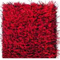 Instalación de césped artificial rojo para parques infantiles · Pavimentos recreativos